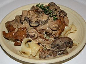 Chicken, Caramelized Onions, and Wild Mushrooms Over Pappardelle Sauced With A Creamy Bacon-Thyme-Balsamic Reduction